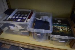 A collection of collector coins and medallions.