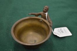 Small brass bowl with figural mounts.
