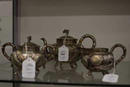 A Chinese silver three piece tea service.