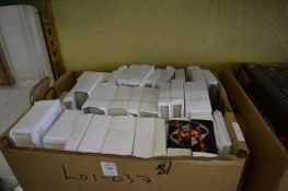 A box of loose sets of cigarette and collectors cards.