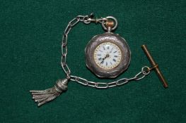 A ladies silver pocket watch.
