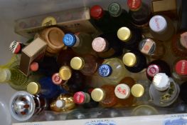 A box of miniature bottles.