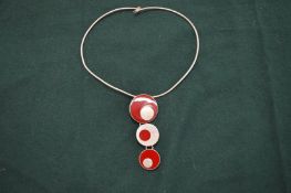 A designer silver and enamel necklace, signed Tego & Co.