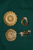Four vintage brooches.