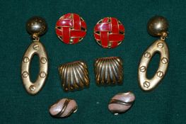 Four pairs of vintage style earrings.
