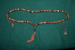 Worry bead necklace.