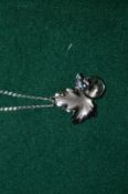 Decorative leaf shaped pendant and chain.