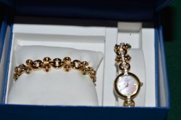 A Rotary boxed ladies wristwatch and matching bracelet.