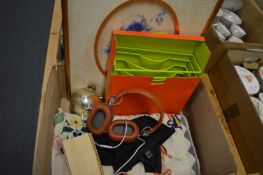 A pair of headphones, an unusual book style light etc.