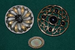 Three vintage brooches.