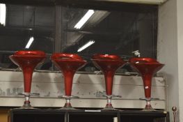 A set of four stylish bar stools.