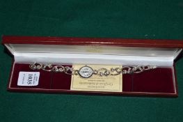 A boxed ladies wristwatch.