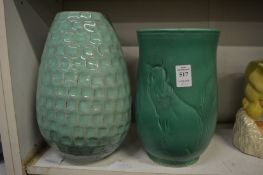 Two decorative green glazed vases.