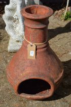 A terracotta chimenea.