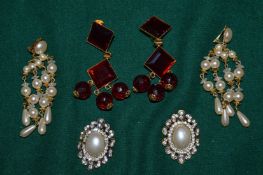 Three pairs of vintage style earrings.