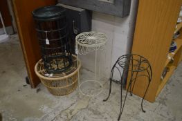 Three plant stands and an occasional table.