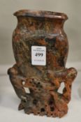 A Chinese carved soap stone vase.