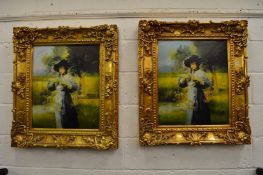 A large pair of gilt framed prints.
