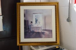 A woman seated by a window, colour print.