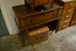 A walnut single drawer side table.