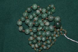 A jade bead necklace.