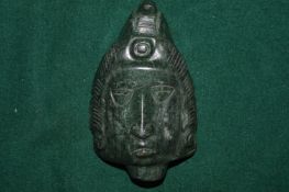 A carved hard stone bust.