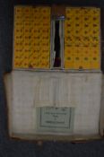 A leather cased mahjong set.