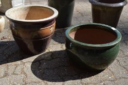 Two glazed garden pots.