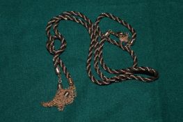 A Guess rope twist necklace.