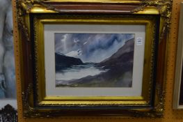 Mountainous river landscape, watercolour, in a decorative frame.