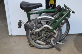 A Brompton folding bike.