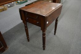 A 19th century mahogany drop-flap work table.