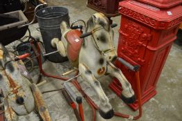A Mobo tin plate rocking horse.