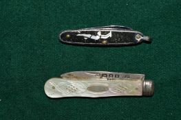 A silver and mother of pearl fruit knife and a small penknife.