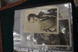 A collection of signed film star photographs to include Henry Fonda, Joan Crawford, John Mills,