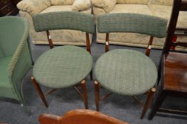 A pair of G Plan dining chairs.
