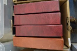 Four albums of cigarette cards.