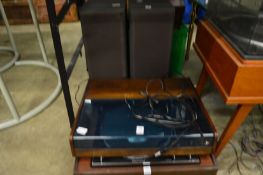 A turntable and pair of speakers.