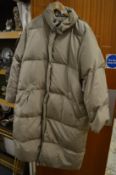 A Max Mara puffa style coat.