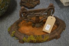 A cast iron boot scraper.