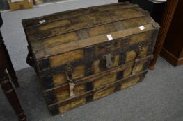 A metal bound dome topped trunk.
