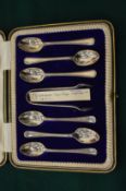 A cased set of six silver coffee spoons with sugar nips.