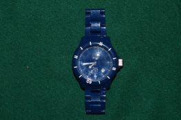 A gentlemans Light Time wristwatch.