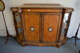 A good Victorian marquetry inlaid figured walnut credenza with ormolu mounts, the pair of panelled