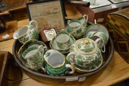 Porcelain part tea service, bedside clock and a small tapestry.