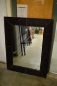 A modern wall mirror.