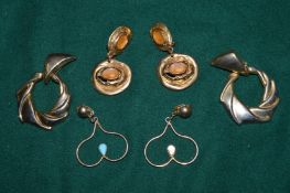 Three pairs of vintage style earrings.