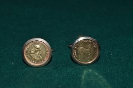 A pair of 9ct gold cufflinks, each mounted with a South African one rand gold coin.