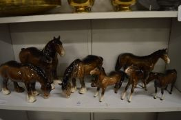 A collection of Beswick horses.