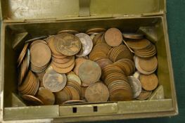 An old cash box containing pre-decimal pennies etc.